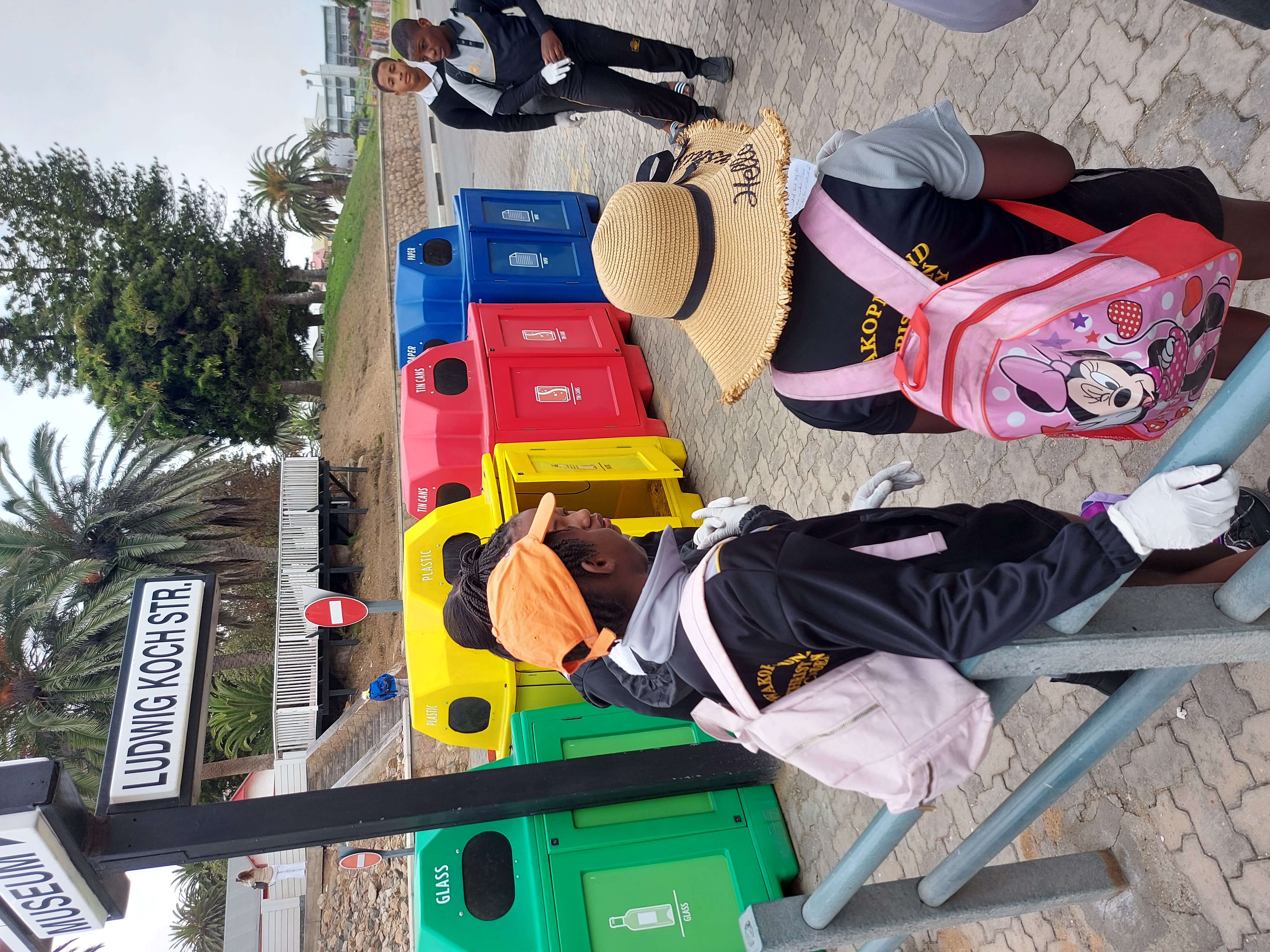 Students cleaning the beach